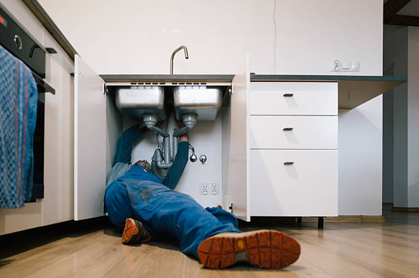 Professional Drain Cleaning technician working in Zanoni, MO